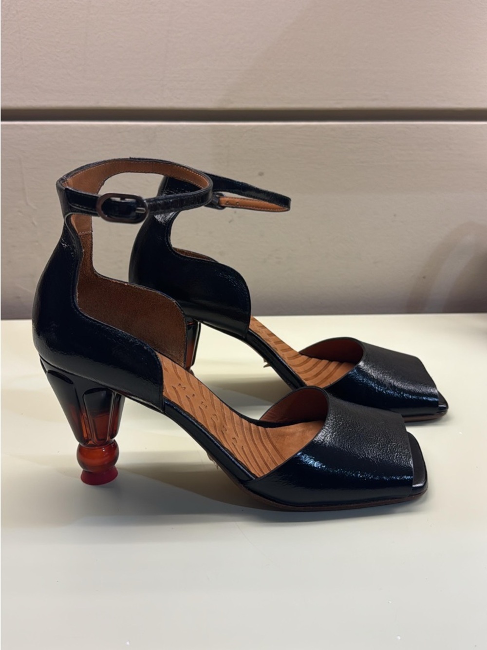 Chie Mihara Black Patent Ankle-Strap Heels with Amber Accent